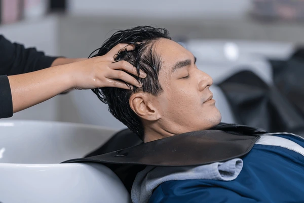 Massage and Exfoliation for mens hair volume